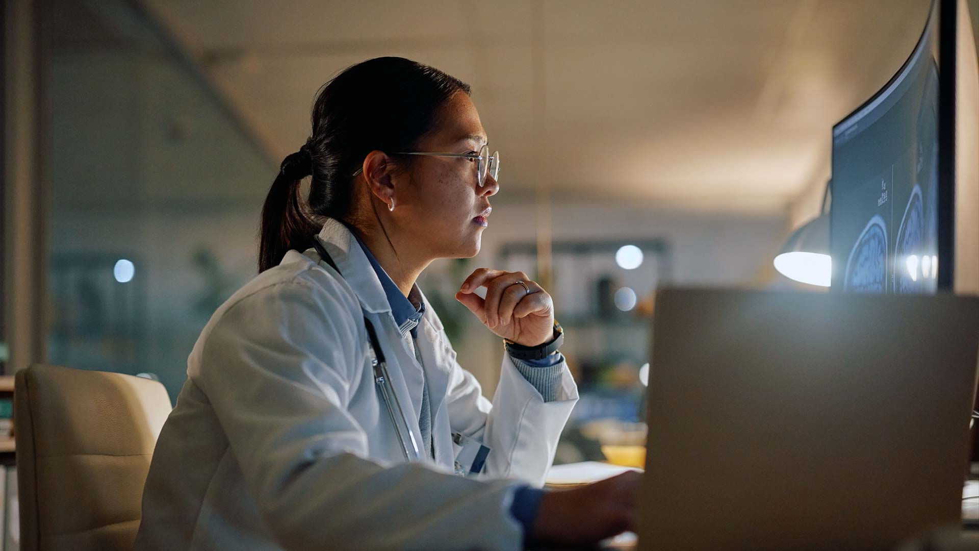 diagnostician reviewing medical imaging results